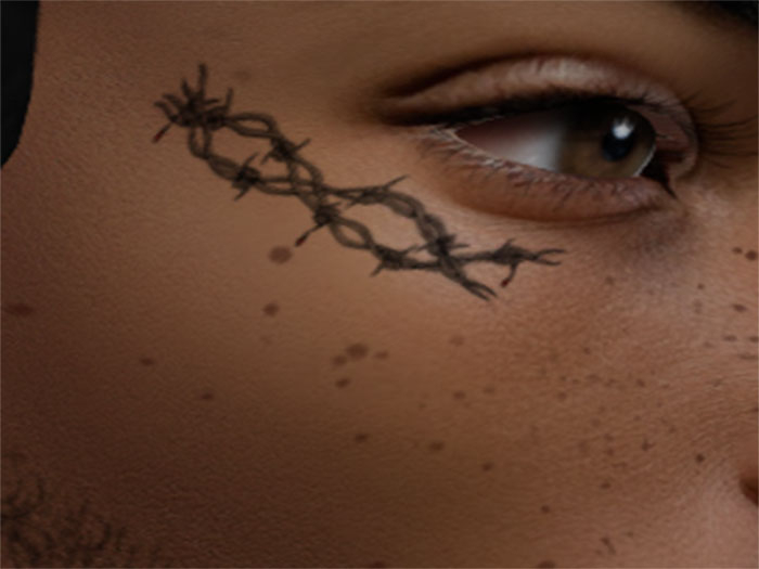 Barbwire face tattoo