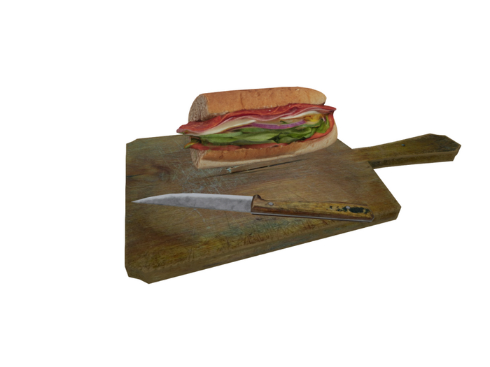 sub sandwich on cutting board