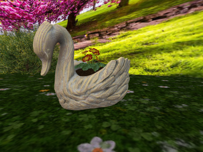 Porcelain Swan with Red/Yellow Primroses