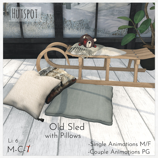 Old Sled with Pillows 