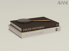 Avani Eyck Collection Magnifying Glass on Stack of Books