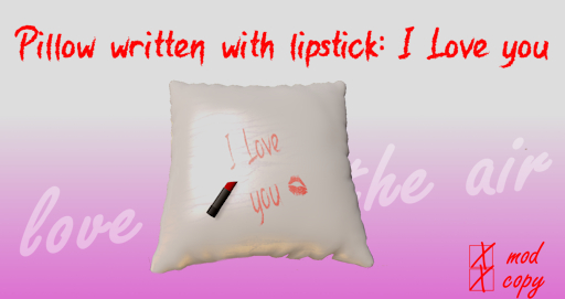 Pillow white with lipstick writing and Lipstick