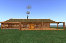 log cabin with realistic fire in a nice fireplace and smoking chimney