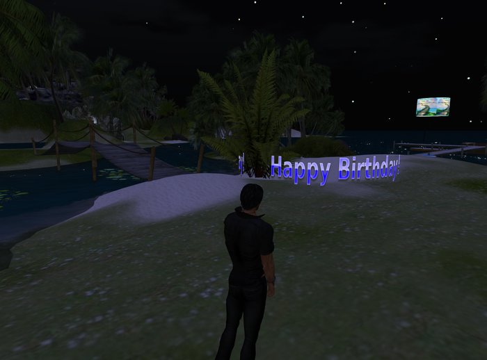 sign rotating blue "happy birthday"