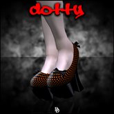 Dare Designs: Dotty pumps - orange