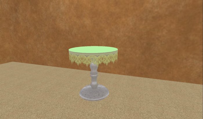 Round table with green lace table cloth