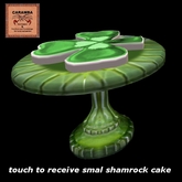 St. Patrick - shamrock shaped cake (green/white fondant)