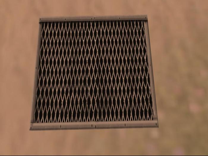 manhole cover (hiding a cage)