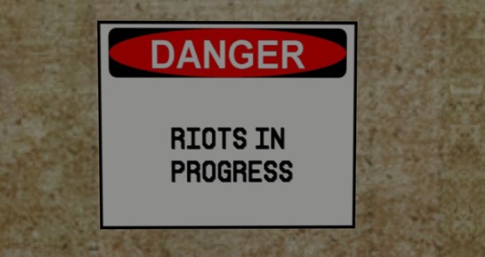 sign DANGER. RIOTS IN PROGRESS