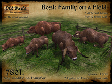 Family of bosks grazing in a field with grass - Old World - Rustic / Medieval