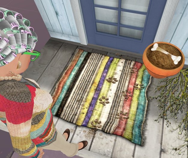 The RR-Muddy Paw Prints Rug-Dog