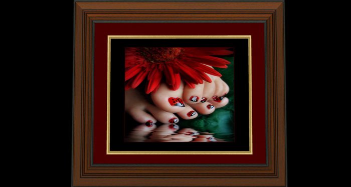 Her ladybug toes framed