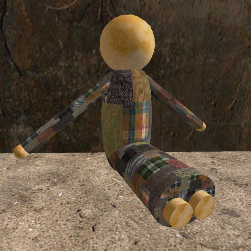 Rag doll sitting - patchwork dress