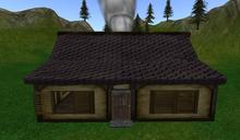 Tiny cottage with realistic fire in a nice fireplace and smoking chimney