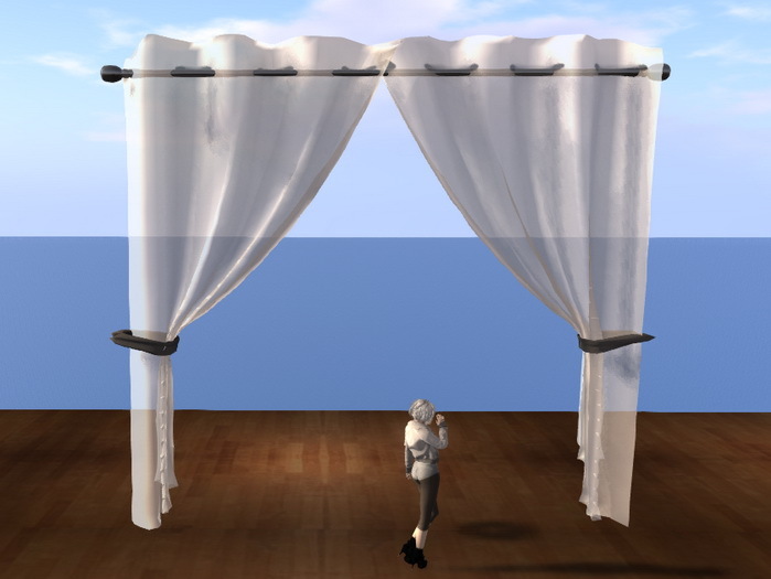 Open White Sheer Draped Curtains