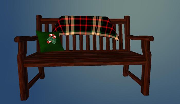 Bench w/plaid blanket & green pillow