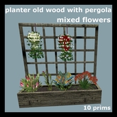 Planter old wood with pergola and mixed flowers