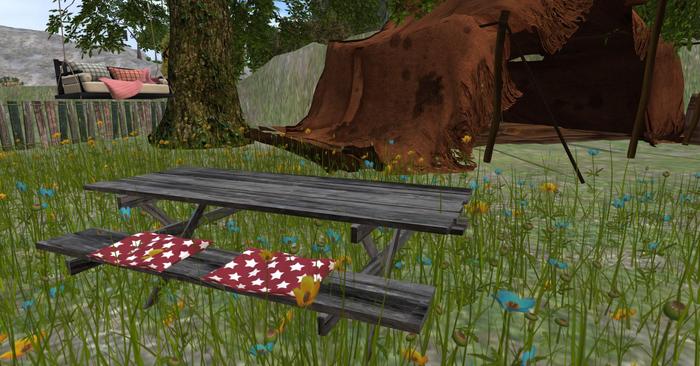 Grey Picnic Table with star pillows